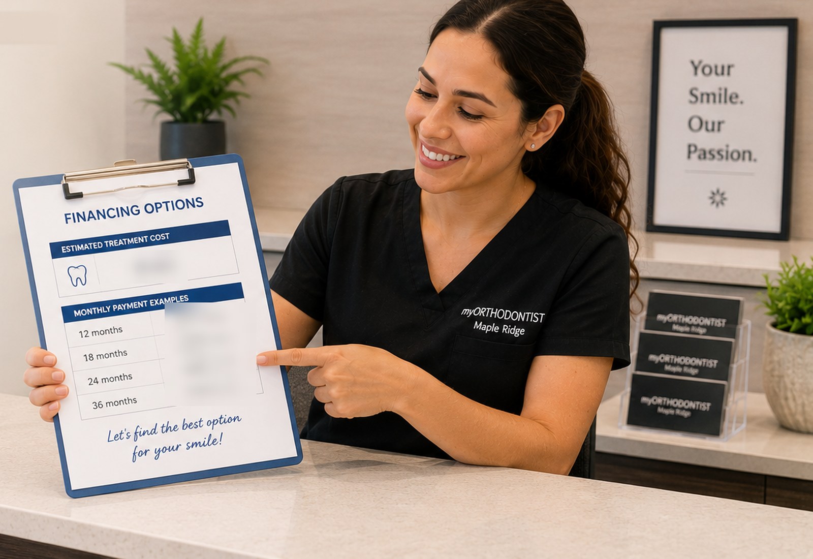 A treatment coordinator at the myORTHODONTIST Maple Ridge front desk showing a financing options sheet listing 12, 18, 24 and 36 month payment terms